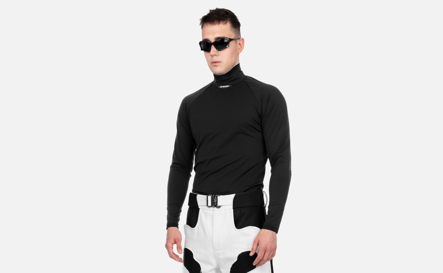 RUNNER TURTLENECK SWEATER